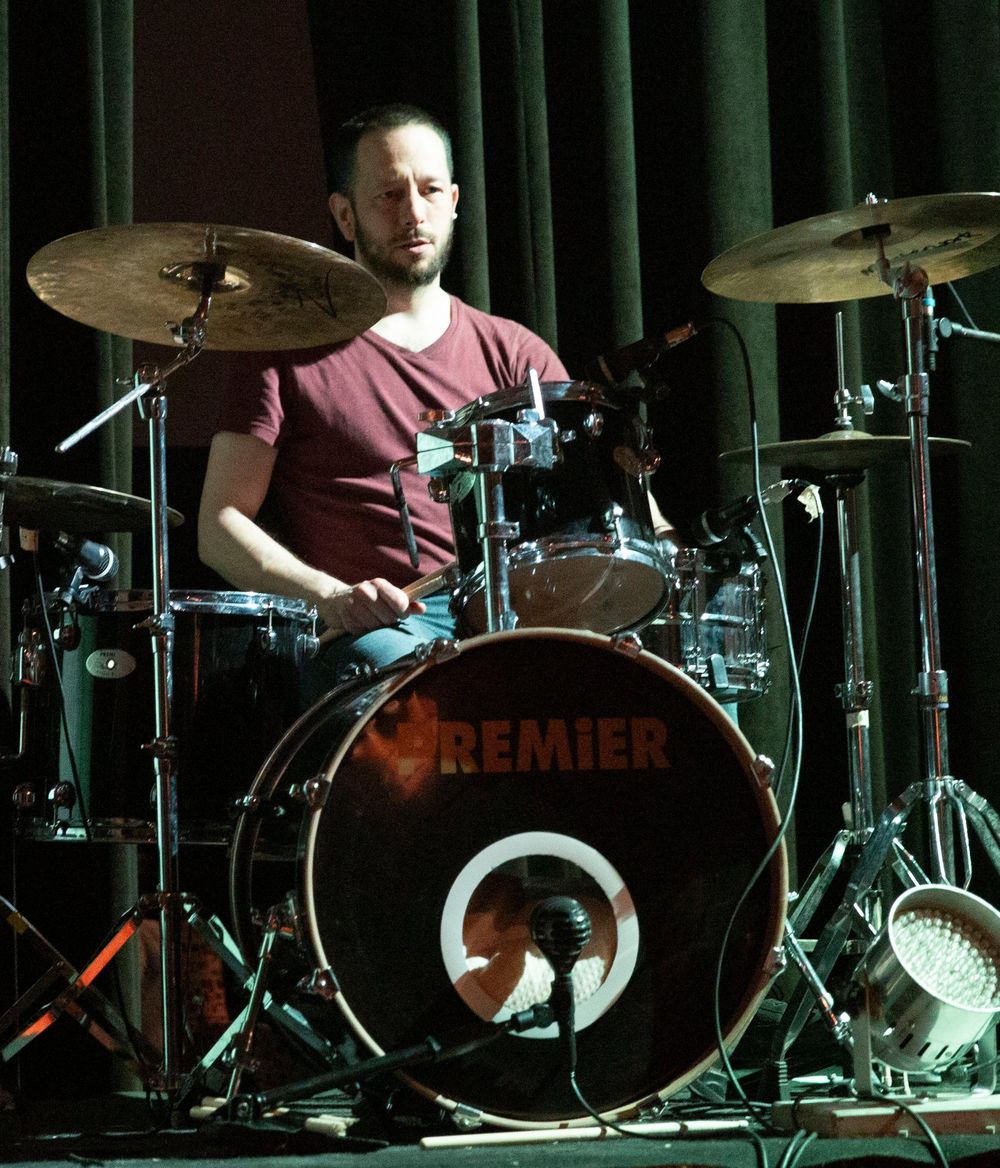 Nebojša Durmanović playing a Premier drum kit on stage